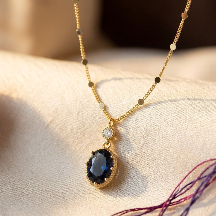 Gold Sapphire Oval Drop Necklace by Rose & Oliver - product image 1